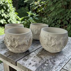 Planter with horses
